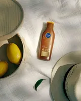 NIVEA SUN Karotin Sonnenlotion SPF 6 200 ml Bräunung & Feuchtigkeit – Bild 3